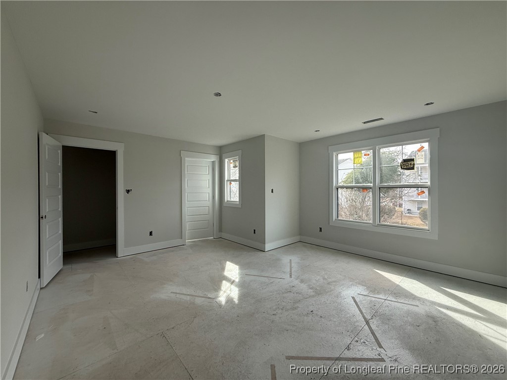 3929 Hamilton Street Hope Mills, NC 28348 - Photo 14 of 26 a view of empty room with windows