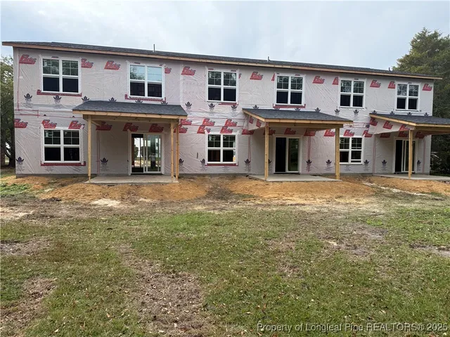 a view of a yard in front of house