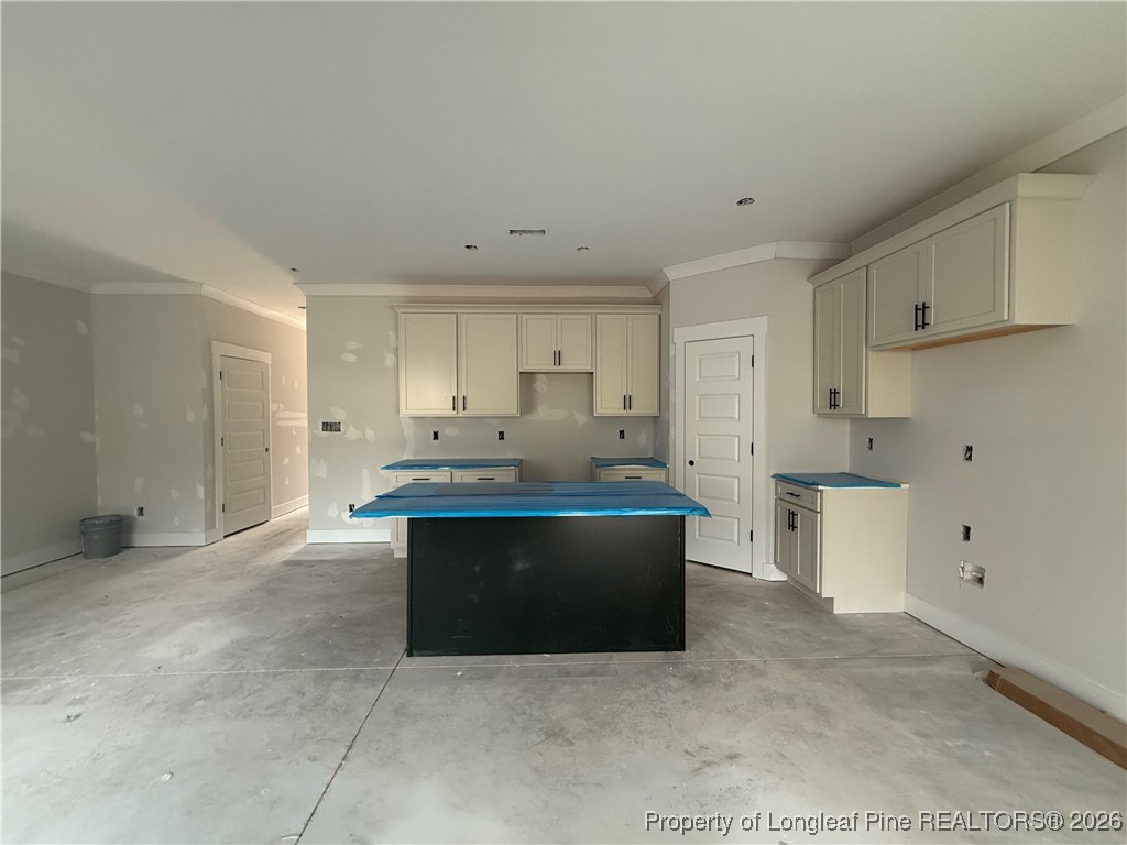 3929 Hamilton Street Hope Mills, NC 28348 - Photo 9 of 26 a view of kitchen with stainless steel appliances kitchen island sink and cabinets