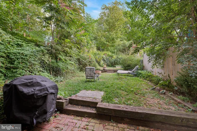 front view of a house with a small yard