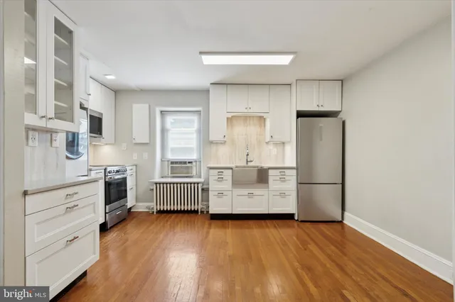 a workspace with furniture and window