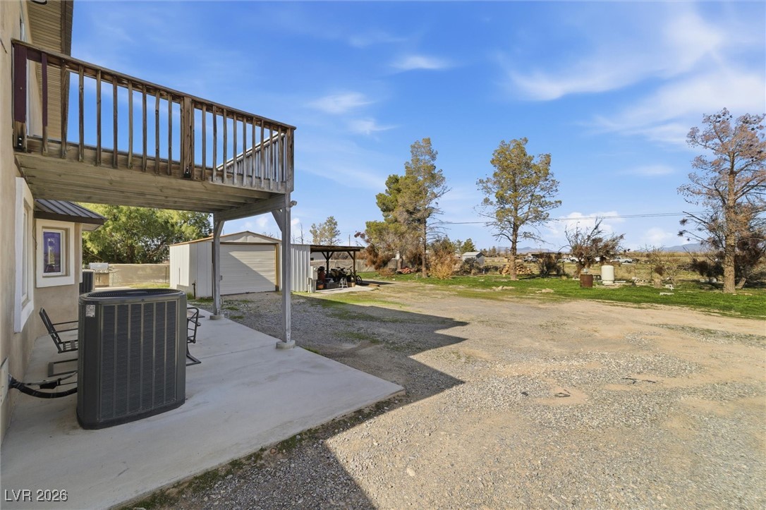 2570 East Kellogg Road Pahrump, NV 89048 - Photo 43 of 60 20x13 storage shed/garage with EV charger and carport