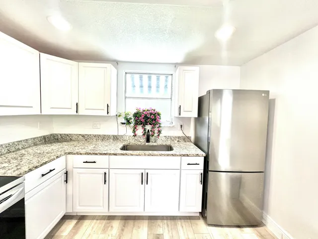 a view of a room that has a window