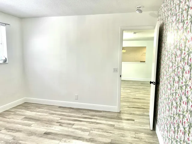 a bathroom with a toilet a sink and a shower