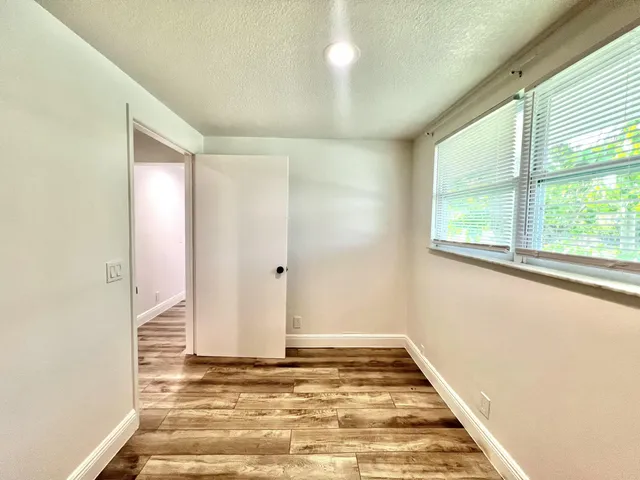 a bathroom with a sink and a shower