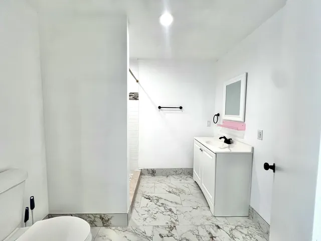 a view of a house with a tree