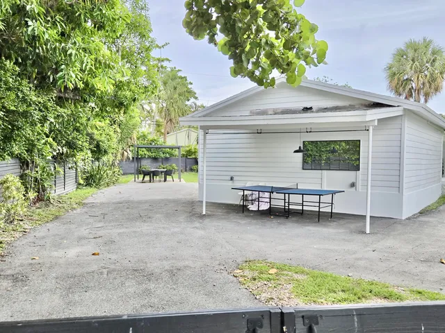 an aerial view of residential building and lake