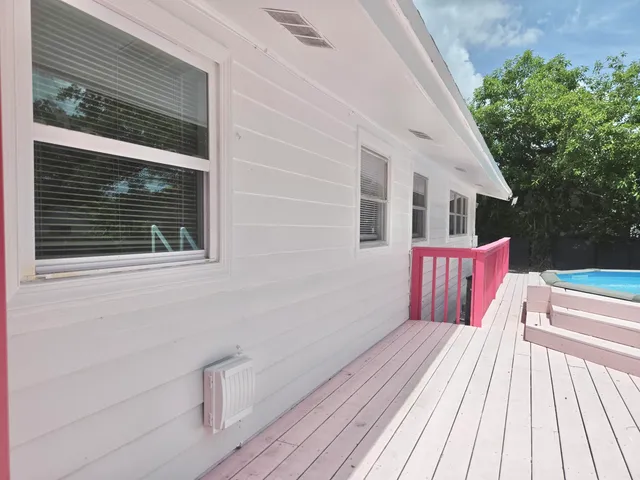 an aerial view of residential building and lake