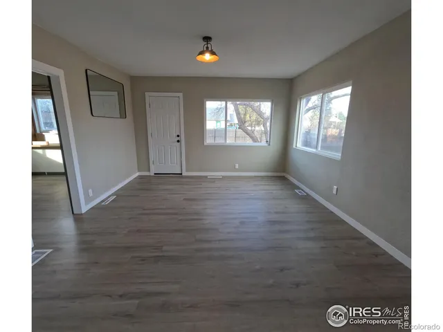 a view of an empty room and window