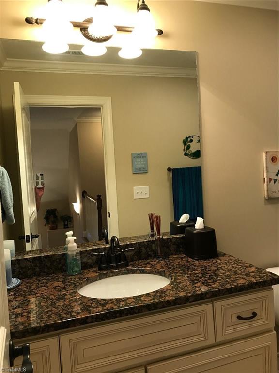 2235 Renaissance Lane High Point, NC 27262 - Photo 24 of 29 Hall Bath 2nd level. Granite tops. Tile floors. Tub/shower