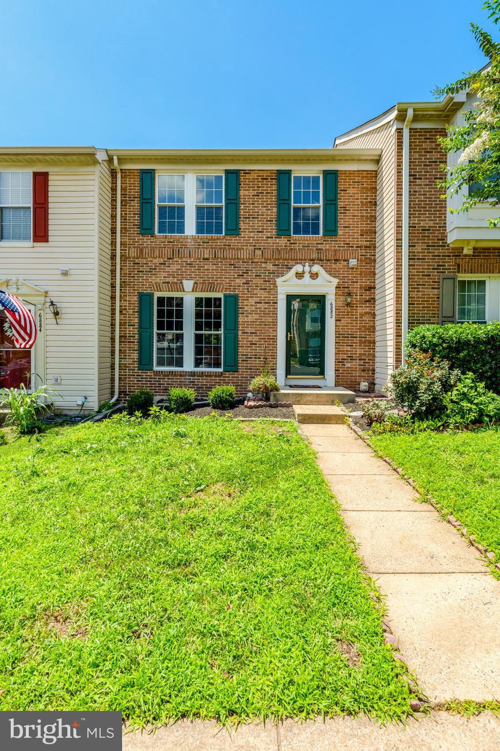 6882 Ridge Water Court Centreville, VA 20121 - Photo 1 of 1 a front view of house with yard and green space