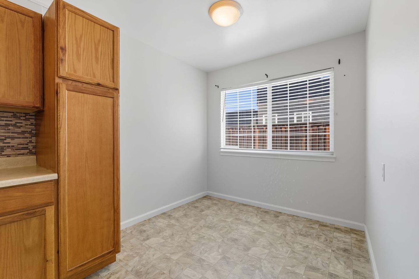 317 Perrymont Avenue San Jose, CA 95125 - Photo 13 of 25 a view of empty room with windows