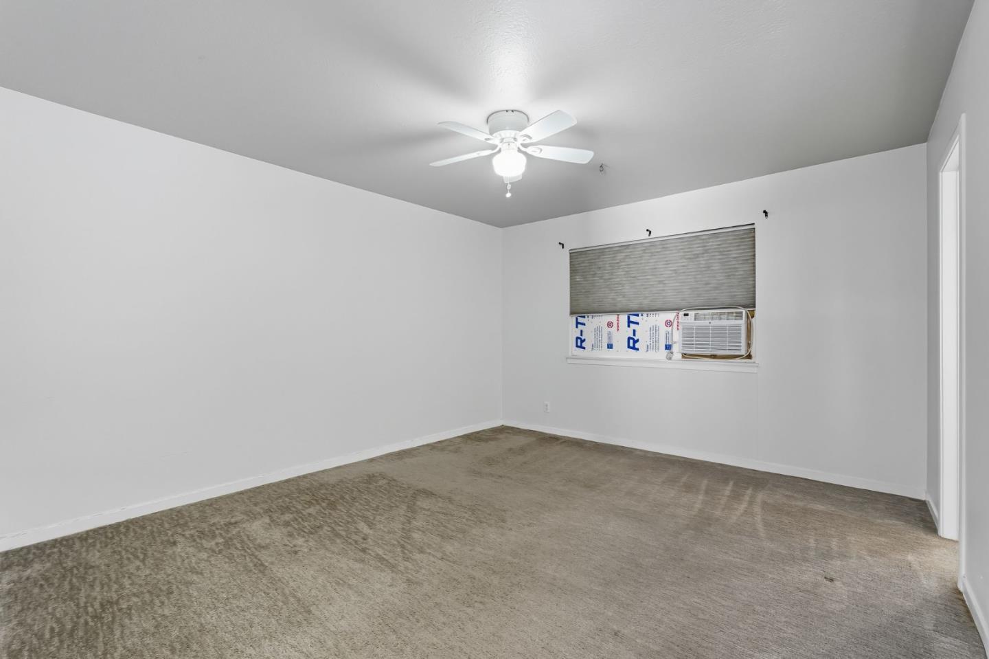 317 Perrymont Avenue San Jose, CA 95125 - Photo 17 of 25 an empty room with fan and fan