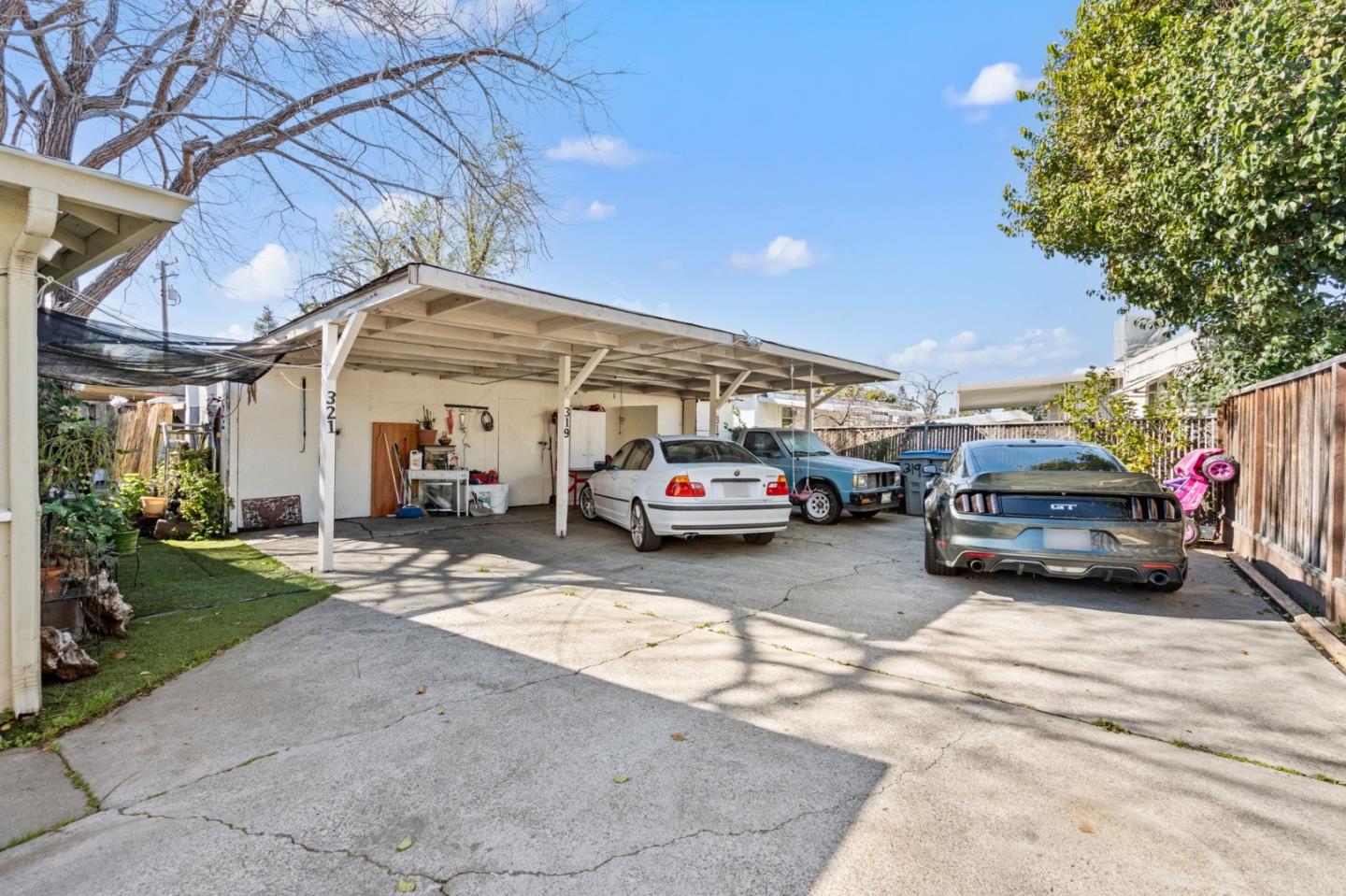 317 Perrymont Avenue San Jose, CA 95125 - Photo 8 of 25 a view of cars parked in front of a house