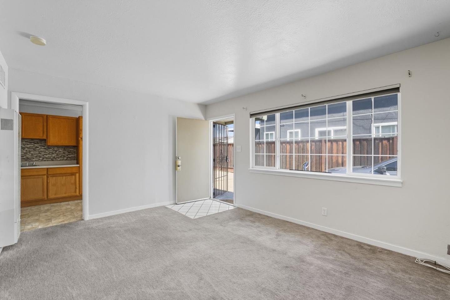 317 Perrymont Avenue San Jose, CA 95125 - Photo 10 of 25 a view of an empty room with a window