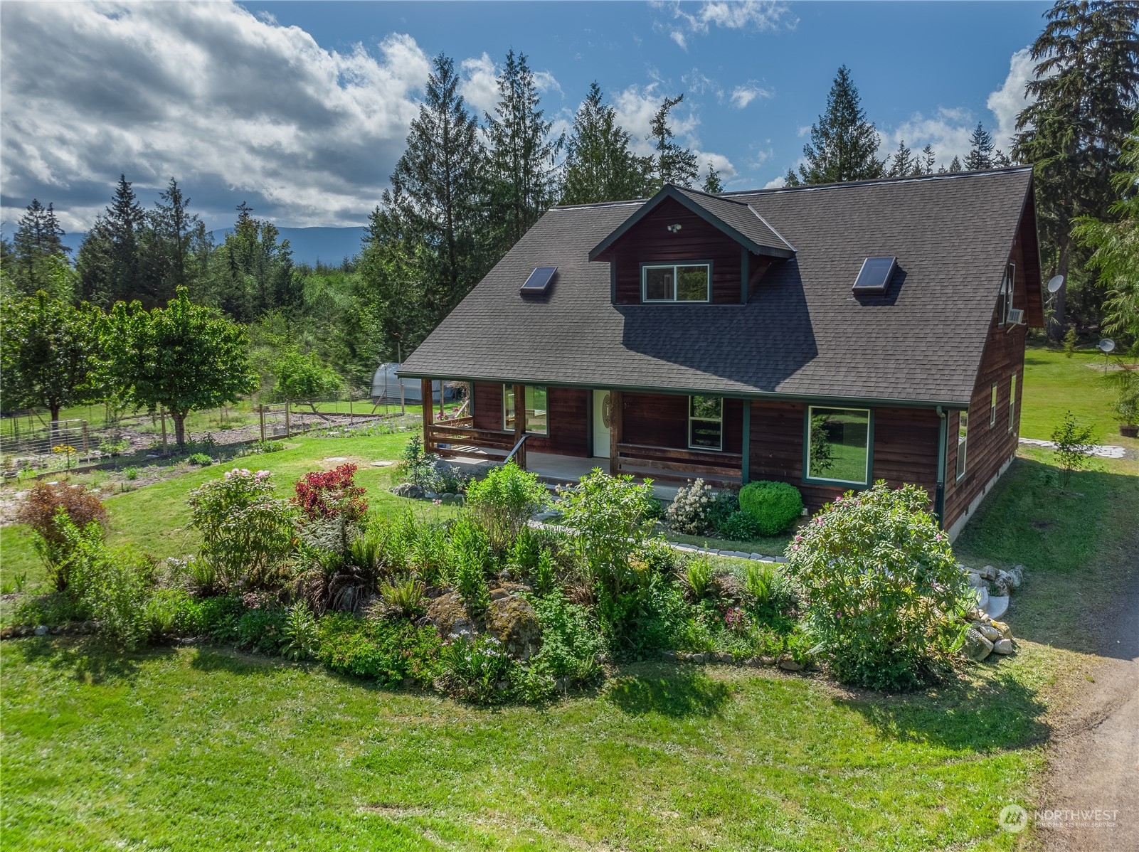 232 Peterson Road Port Townsend, WA 98368 - Photo 2 of 32 a front view of a house with a yard