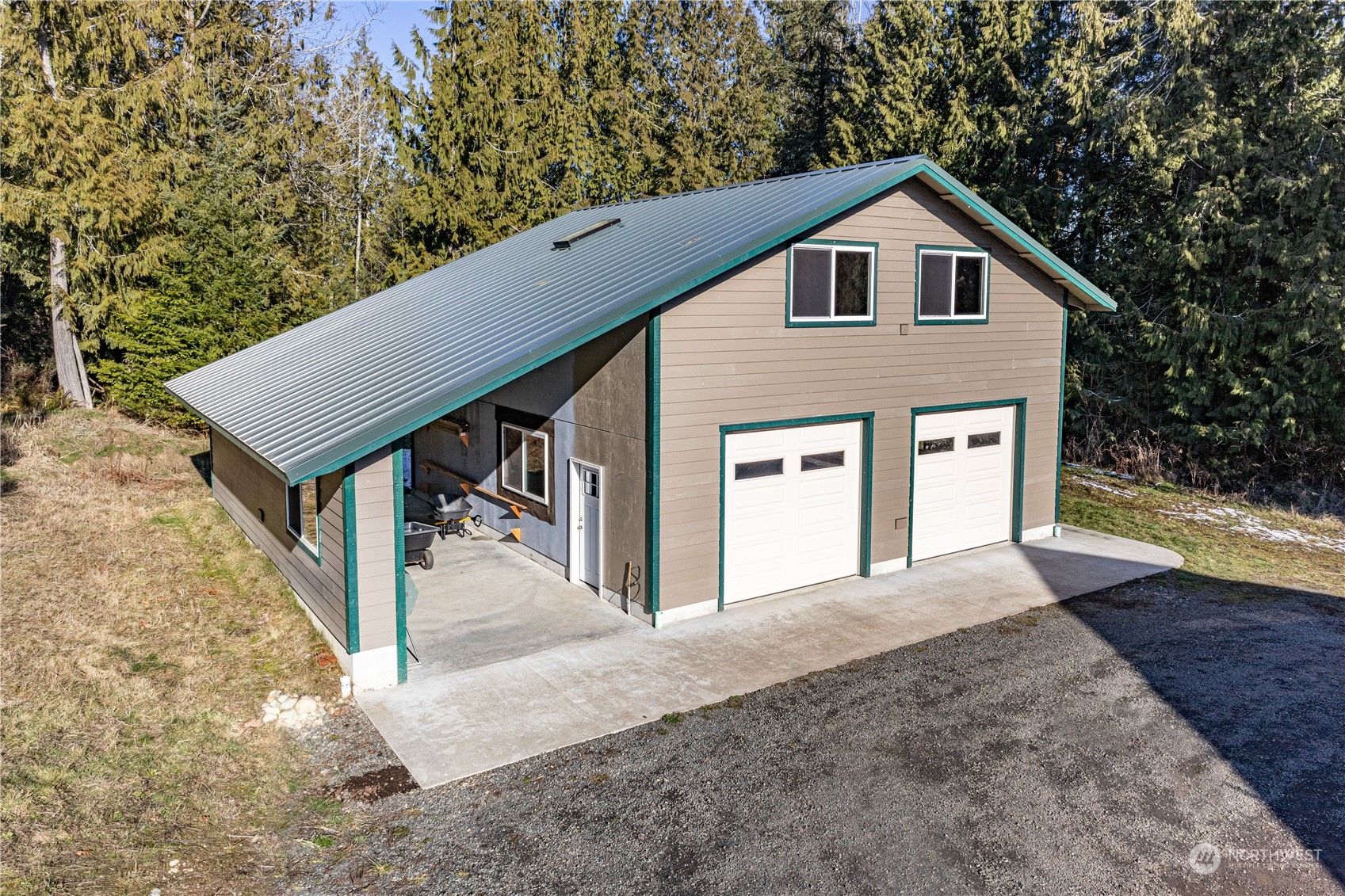232 Peterson Road Port Townsend, WA 98368 - Photo 22 of 32 a view of a house with a yard balcony and wooden fence