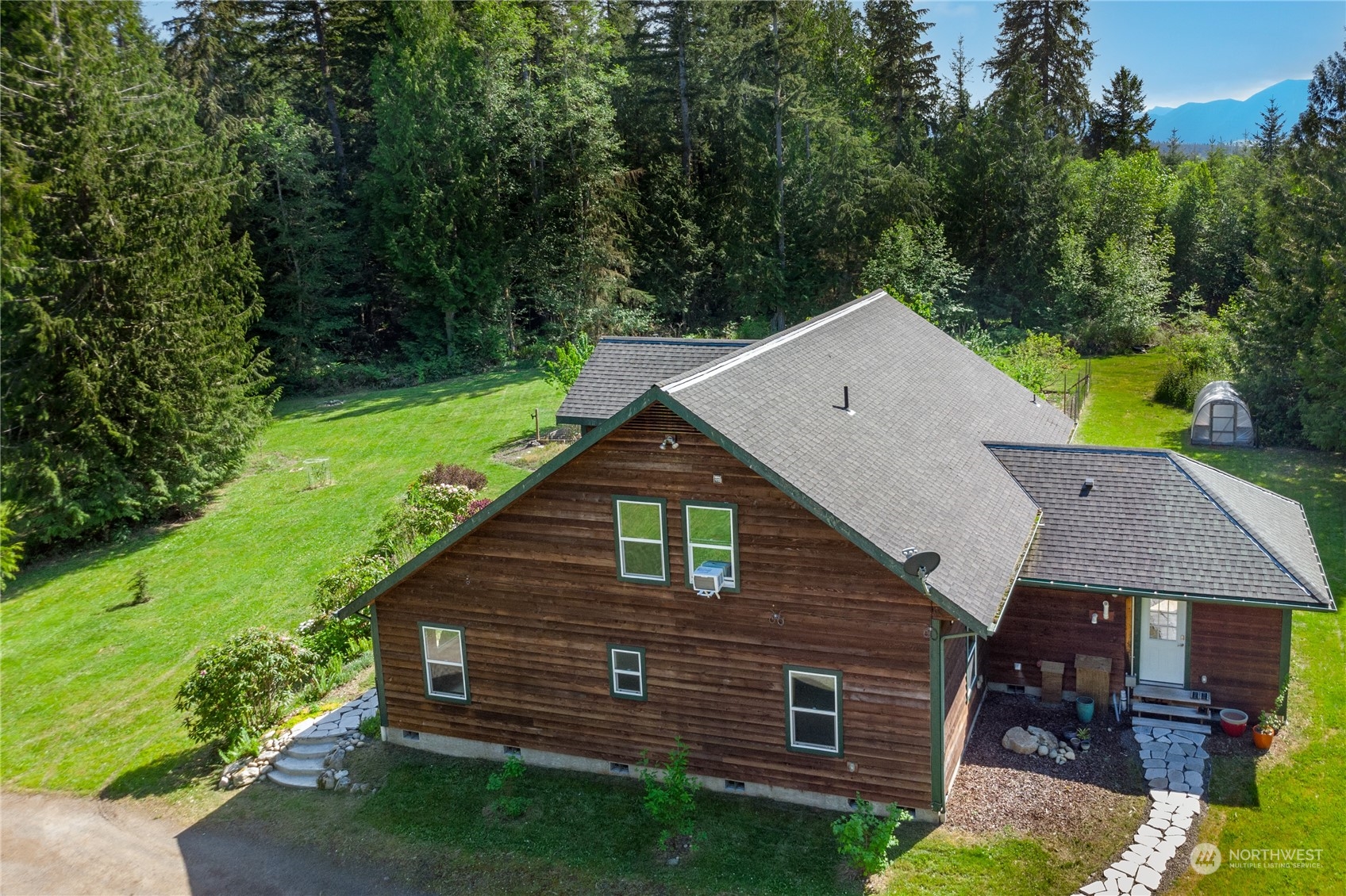 232 Peterson Road Port Townsend, WA 98368 - Photo 25 of 32 a aerial view of a house with a yard