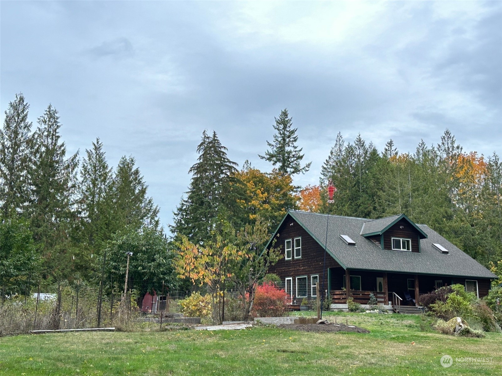 232 Peterson Road Port Townsend, WA 98368 - Photo 29 of 32 a front view of a house with a yard