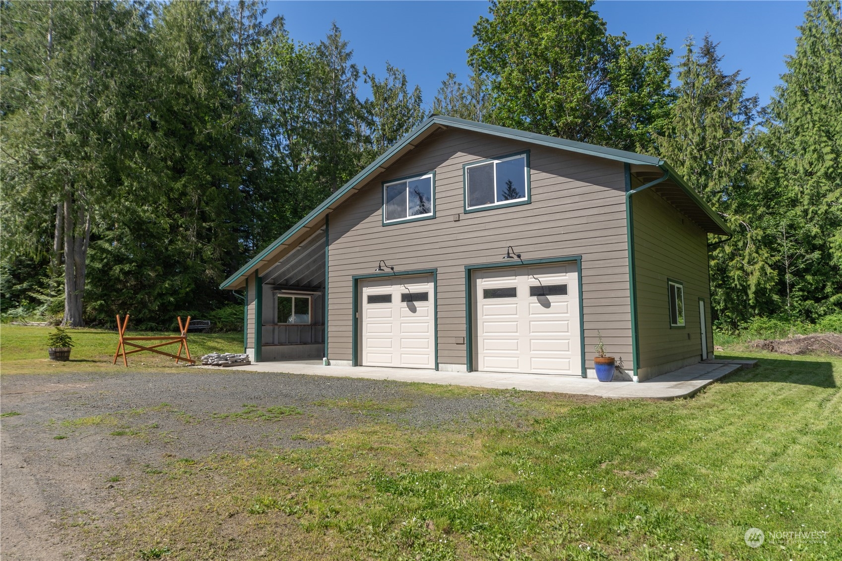 232 Peterson Road Port Townsend, WA 98368 - Photo 31 of 32 a front view of a house with garden