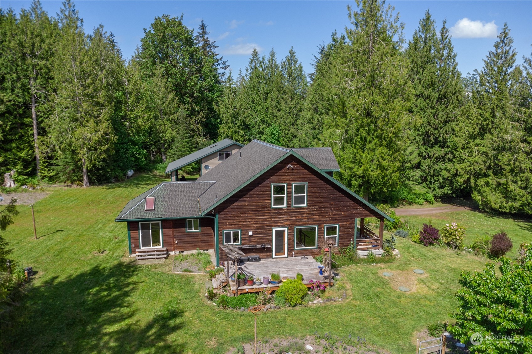232 Peterson Road Port Townsend, WA 98368 - Photo 32 of 32 a front view of a house with garden
