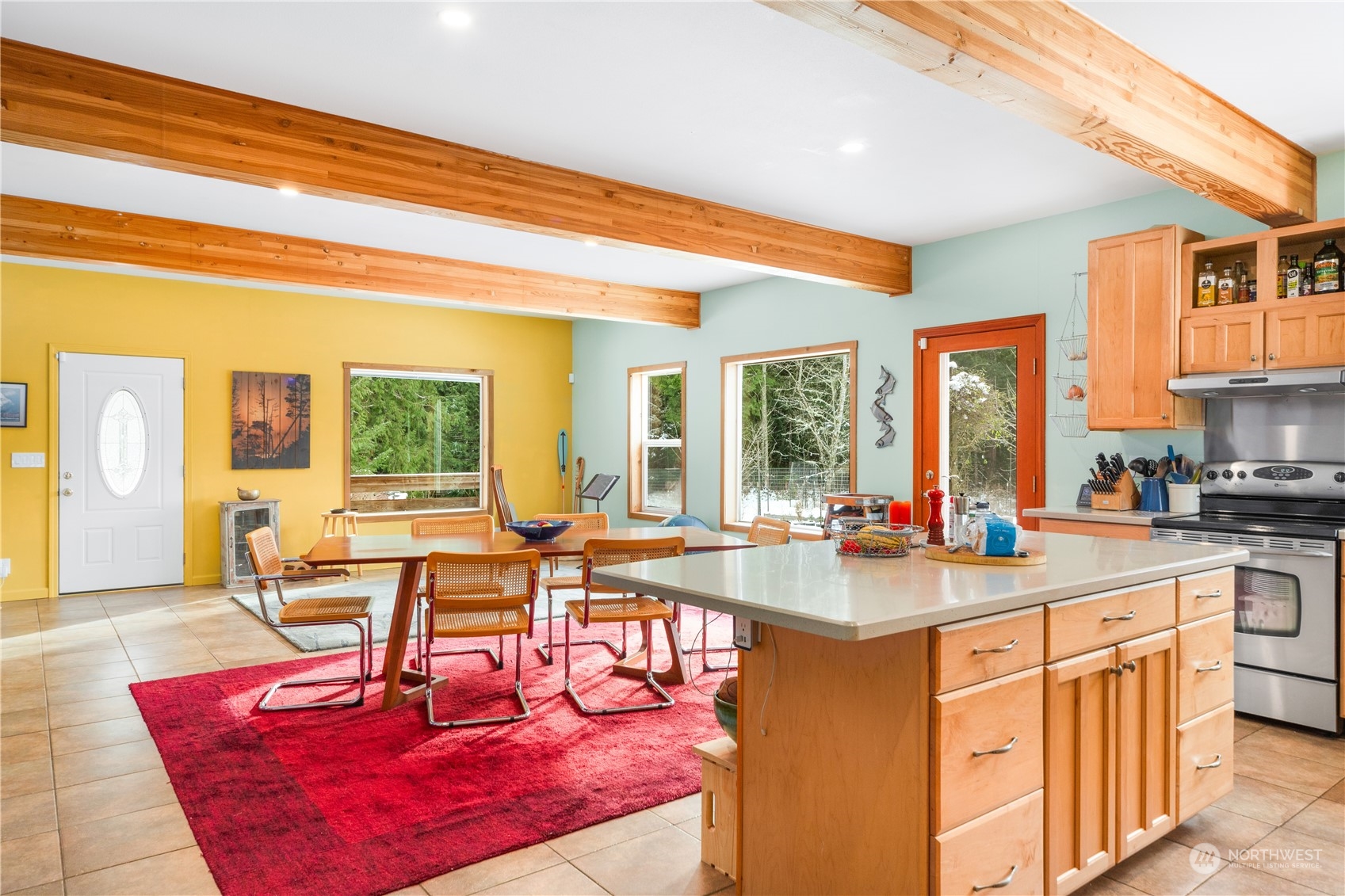 232 Peterson Road Port Townsend, WA 98368 - Photo 6 of 32 a kitchen with a counter top space a sink cabinets and appliances