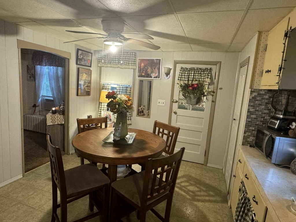 539 Aetna Street Fall River, MA 02721 - Photo 11 of 22 a dining room with furniture and window