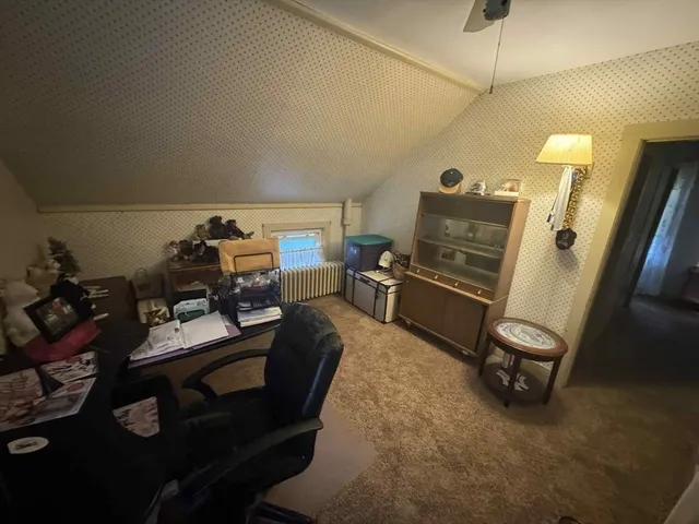 a room with furniture and a chandelier