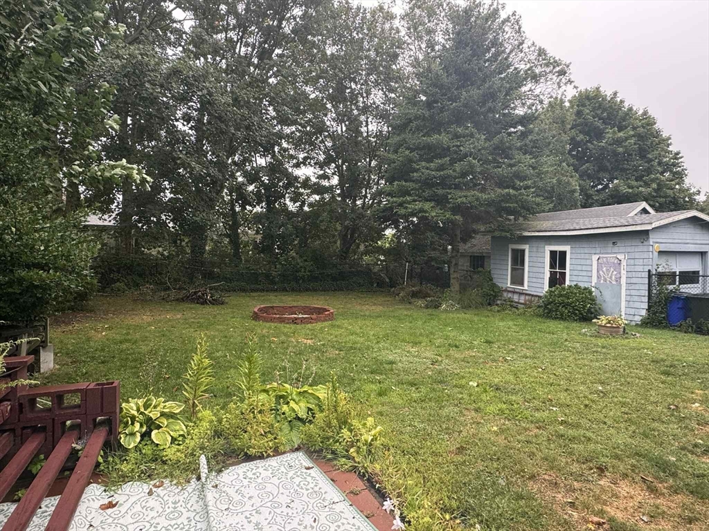 539 Aetna Street Fall River, MA 02721 - Photo 6 of 22 a view of a house with backyard