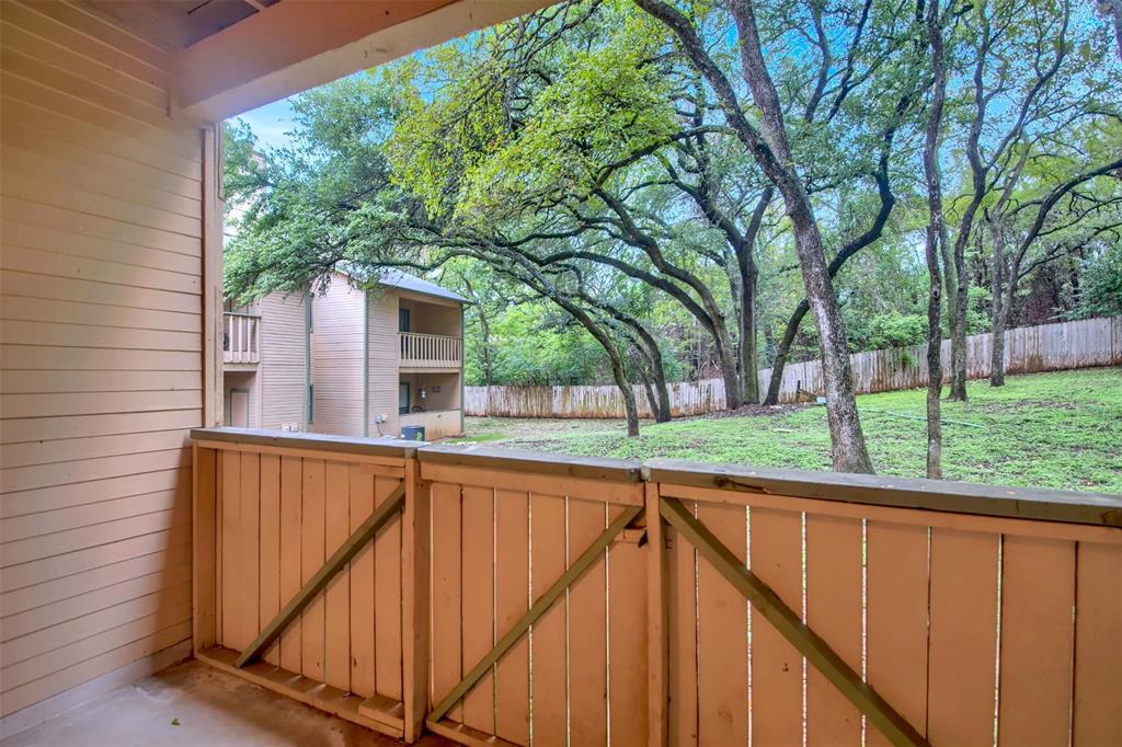 9100 Mountain Ridge Drive, Unit 102 Austin, TX 78759 - Photo 22 of 24 Gate with a balcony