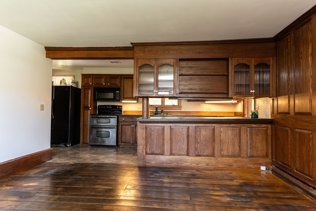 92 Burrington Road Heath, MA 01346 - Photo 19 of 30 a view of kitchen with furniture and wooden floor