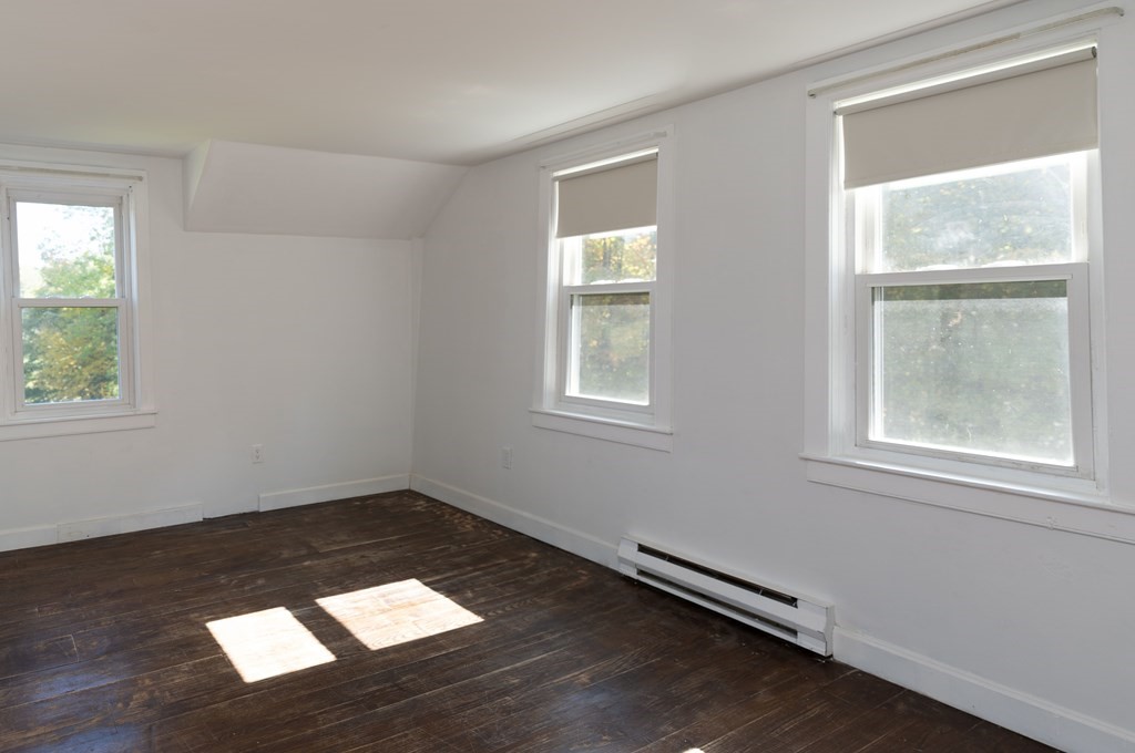 92 Burrington Road Heath, MA 01346 - Photo 23 of 30 an empty room with wooden floor and windows
