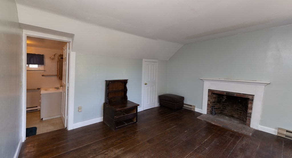 92 Burrington Road Heath, MA 01346 - Photo 24 of 30 a living room with furniture and a fireplace
