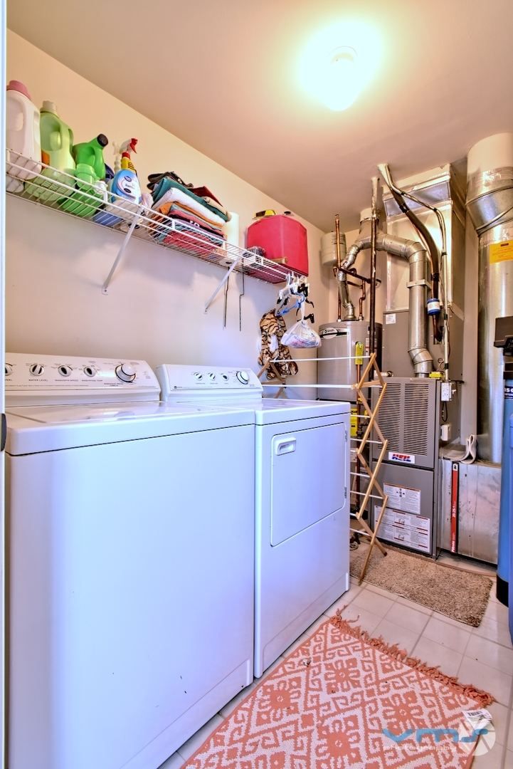 201 Grand Ridge Road St. Charles, IL 60175 - Photo 12 of 20 a utility room with dryer and washer