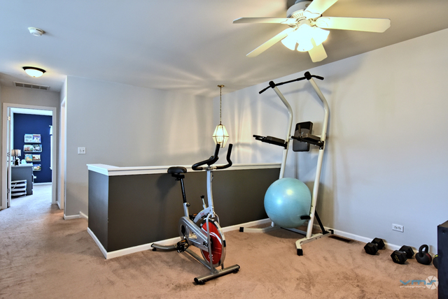 201 Grand Ridge Road St. Charles, IL 60175 - Photo 14 of 20 a view of a room with gym equipment