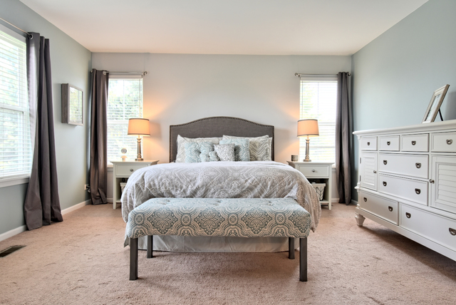 201 Grand Ridge Road St. Charles, IL 60175 - Photo 15 of 20 a bedroom with a bed and a dresser