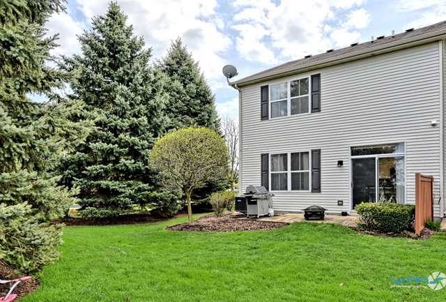 201 Grand Ridge Road St. Charles, IL 60175 - Photo 20 of 20 a view of a house with backyard and sitting area
