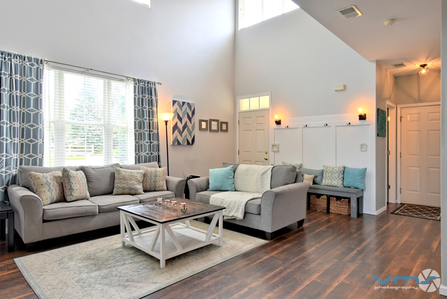 201 Grand Ridge Road St. Charles, IL 60175 - Photo 4 of 20 a living room with furniture and a large window
