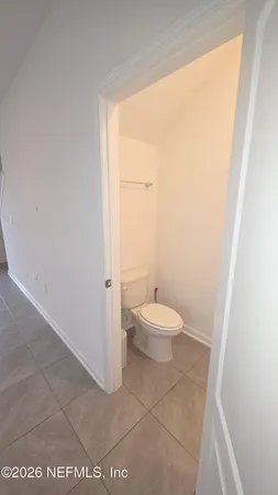 a bathroom with a toilet