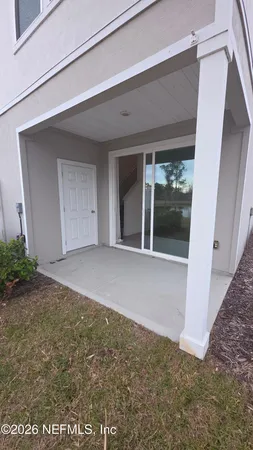 a view of a street with sign board