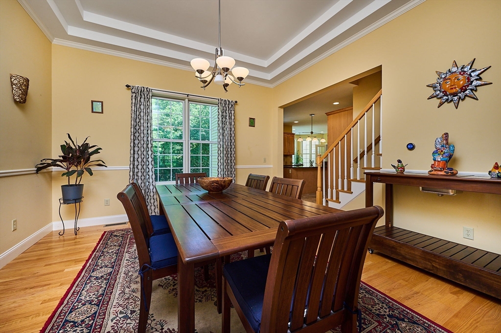5 Deer Haven Drive Williamsburg, MA 01039 - Photo 14 of 42 a view of a dining room with furniture window and wooden floor
