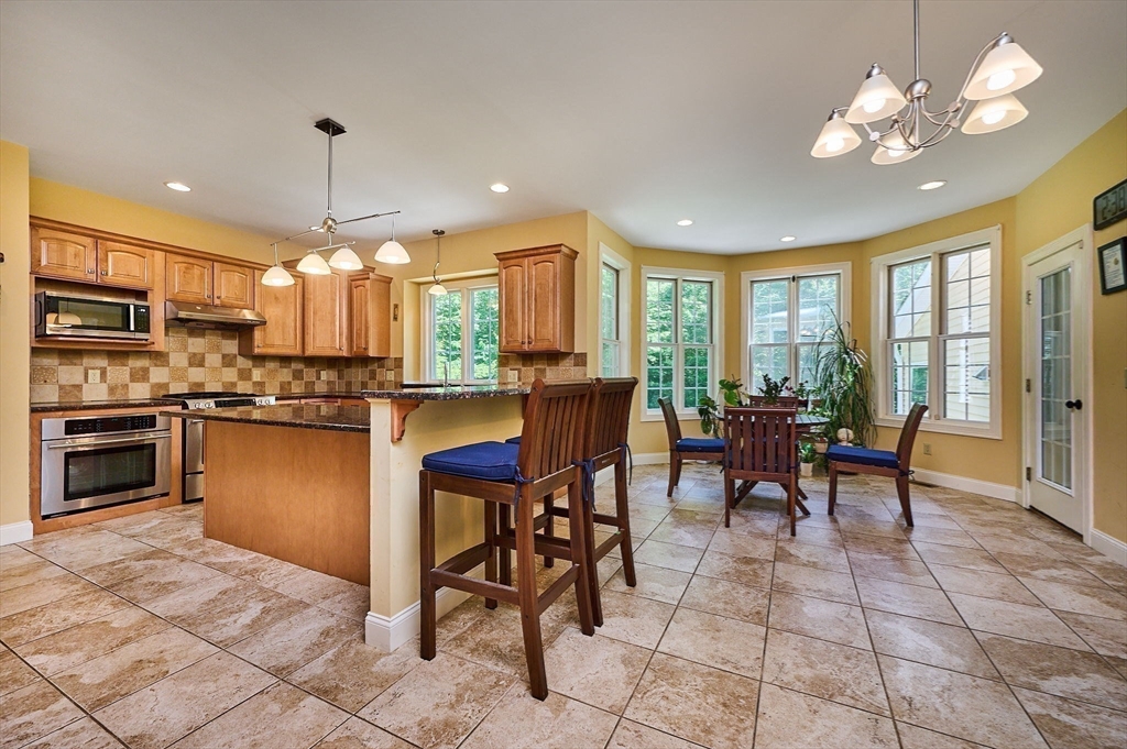5 Deer Haven Drive Williamsburg, MA 01039 - Photo 18 of 42 a view of a dining room kitchen and a window