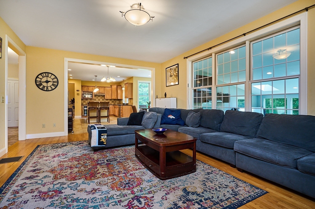 5 Deer Haven Drive Williamsburg, MA 01039 - Photo 20 of 42 a living room with furniture and a large window