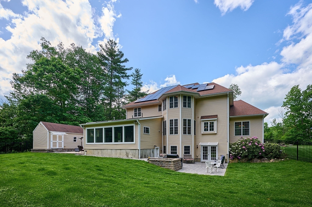 5 Deer Haven Drive Williamsburg, MA 01039 - Photo 2 of 42 a front view of a house with a garden and yard