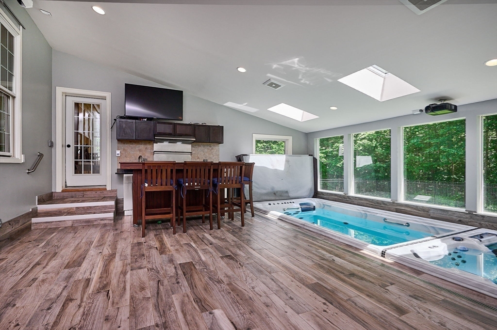 5 Deer Haven Drive Williamsburg, MA 01039 - Photo 21 of 42 a living room with furniture appliances and wooden floor