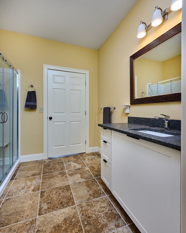 5 Deer Haven Drive Williamsburg, MA 01039 - Photo 25 of 42 a bathroom with a sink and a mirror