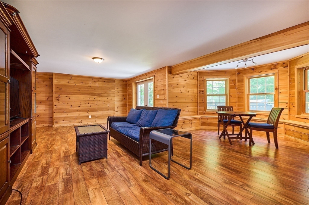 5 Deer Haven Drive Williamsburg, MA 01039 - Photo 28 of 42 a living room with furniture and wooden floor