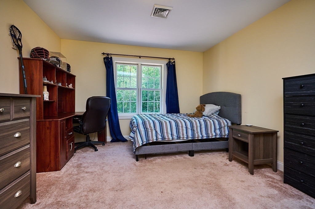 5 Deer Haven Drive Williamsburg, MA 01039 - Photo 36 of 42 a bedroom with a bed and a window