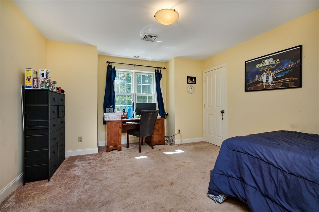 5 Deer Haven Drive Williamsburg, MA 01039 - Photo 38 of 42 a bedroom with a bed and a desk