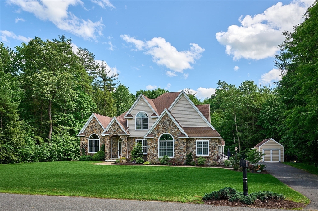 5 Deer Haven Drive Williamsburg, MA 01039 - Photo 40 of 42 a front view of a house with garden
